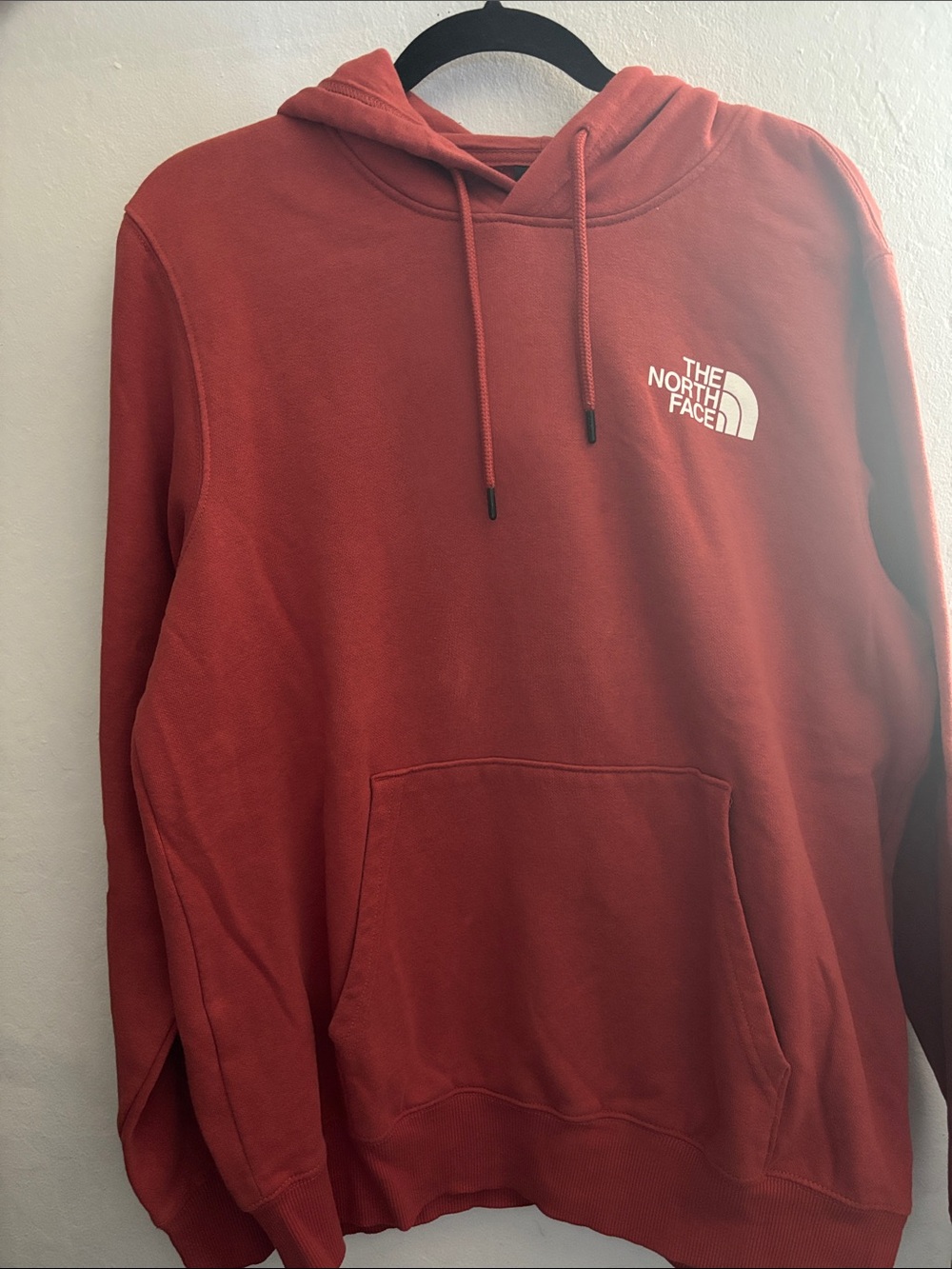 The North Face Men’s Rust Hoodie with White Logo